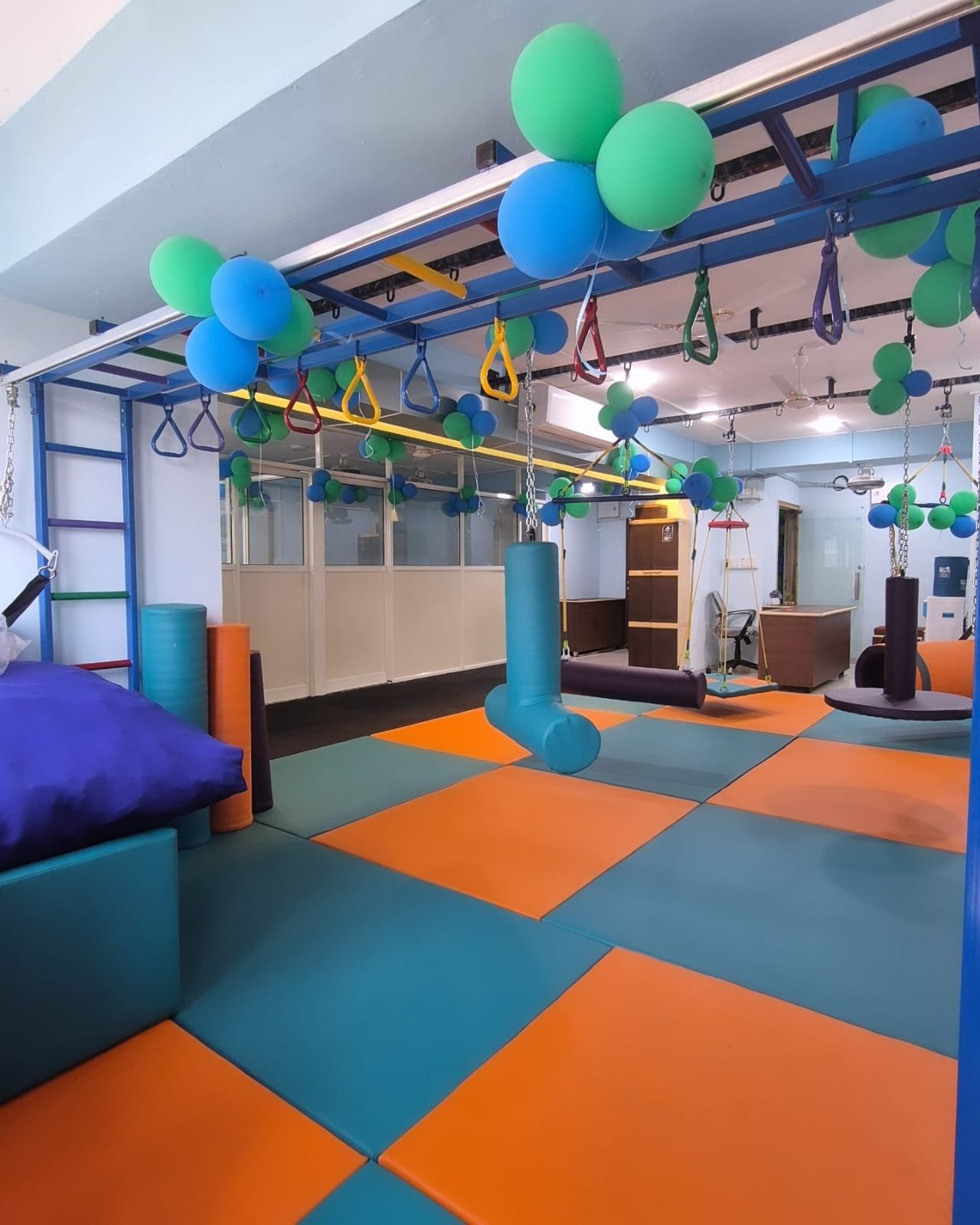 Sensory integration swings and climbing therapy corner